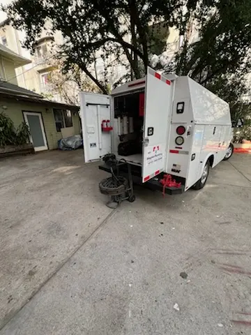 Magnet Plumbing service vehicle on-site for Water Heater Repair in Marquard Manor